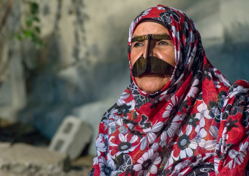 a bandari woman wearing a traditional mask called the burqa, Qeshm Island, Salakh, Iran