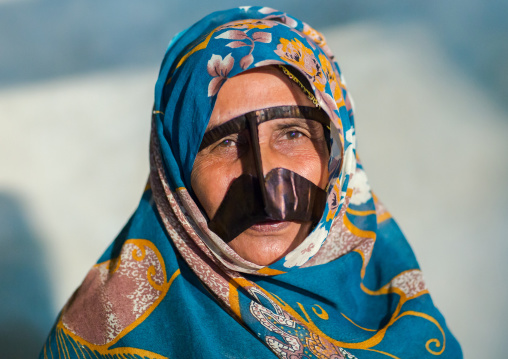 a bandari woman wearing a traditional mask called the burqa, Qeshm Island, Salakh, Iran