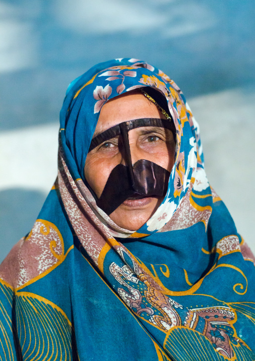 a bandari woman wearing a traditional mask called the burqa, Qeshm Island, Salakh, Iran