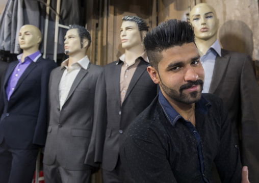 Young man with spiky haircut in the bazaar, Isfahan province, Isfahan, Iran