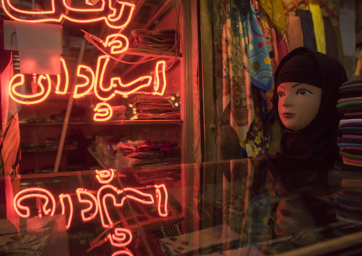 Veils shop with red neons, Isfahan province, Isfahan, Iran