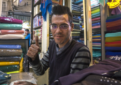 Young man with spiky haircut in the bazaar, Shemiranat county, Tehran, Iran