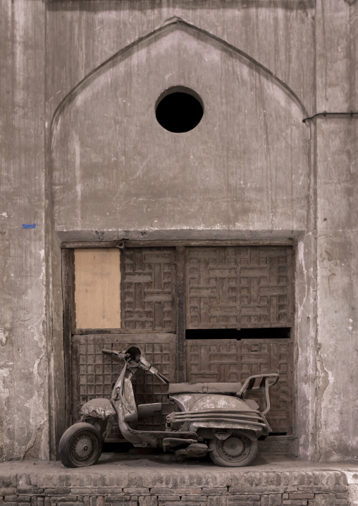 Abandoned scooter in the bazaar, Isfahan province, Kashan, Iran