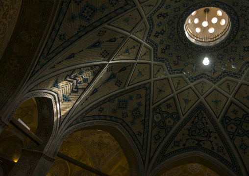 Ceiling with its intricate and elaborate patterns and internal stainless glass dome in sultan amir ahmad bathhouse ceiling, Isfahan province, Kashan, Iran