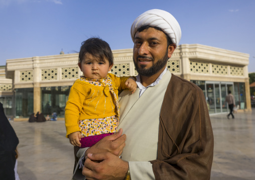 A cleric with his daughter, Qom province, Qom, Iran