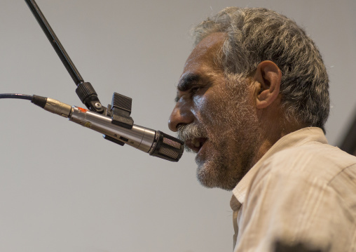 Man singing during the traditional sport of zurkhaneh, Isfahan province, Kashan, Iran