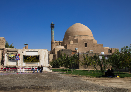 Men waiting for Muharram ceremony in front of an old shrine, Isfahan Province, Isfahan, Iran