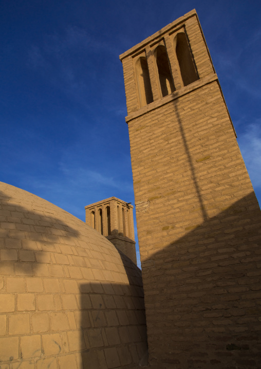 Wind towers used as a natural cooling system for water reservoir in iranian traditional architecture, Isfahan Province, Ardestan, Iran