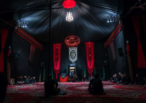 An Hosseinieh decorated for Muharram where shiite men come to worship Imam Hussein, Isfahan Province, Kashan, Iran