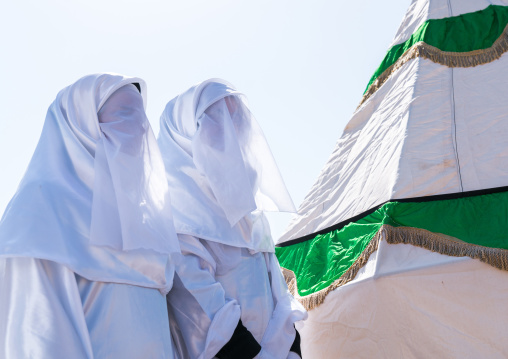 Women in white chadors during a traditional religious theatre called tazieh about Imam Hussein death in Kerbala, Lorestan Province, Khorramabad, Iran