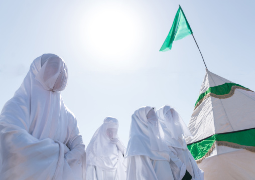 Women in white chadors during a traditional religious theatre called tazieh about Imam Hussein death in Kerbala, Lorestan Province, Khorramabad, Iran