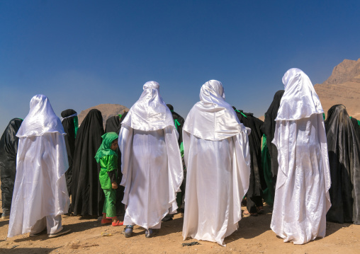 Women in white chadors during a traditional religious theatre called tazieh about Imam Hussein death in Kerbala, Lorestan Province, Khorramabad, Iran