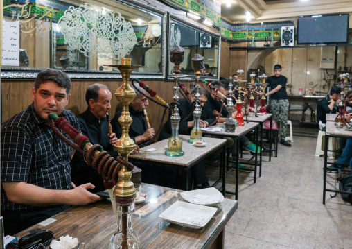 Men smoking water pipes in the bazaar, Central County, Theran, Iran