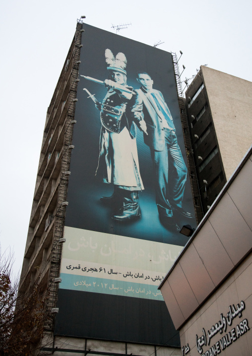 giant billboard showing barack obama with shmer, a villain in shia islam, on valiasr square, Central district, Tehran, Iran