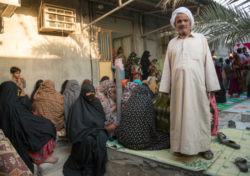 father of the groom in the women area during a traditional wedding, Qeshm Island, Salakh, Iran