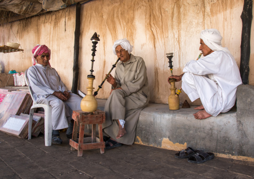 old bandari sailors smoking pipes, Hormozgan, Bandar-e Kong, Iran