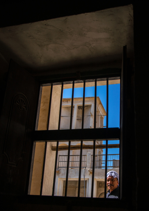 wind tower seen thru a window, Hormozgan, Bandar-e Kong, Iran