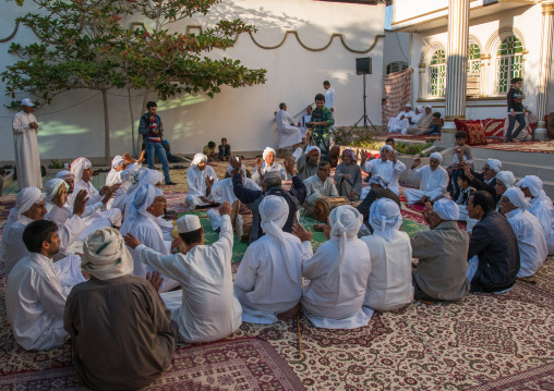 men singig during a wedding ceremony, Hormozgan, Bandar-e Kong, Iran