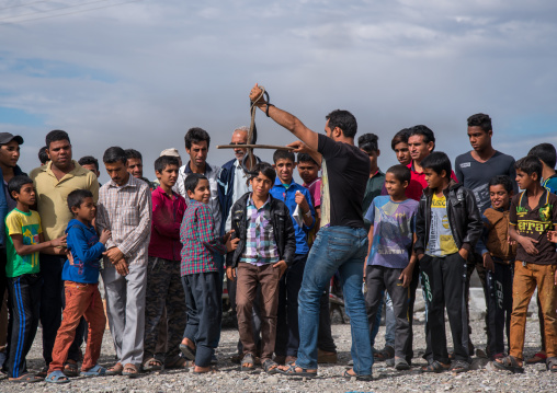 man showing a snake to the spectators, Hormozgan, Minab, Iran