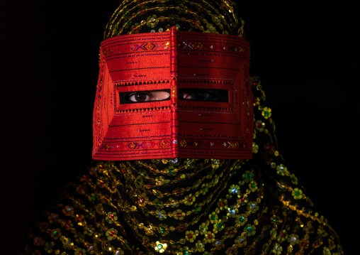 a bandari woman wearing a traditional mask called the burqa, Hormozgan, Minab, Iran