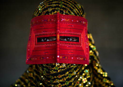 a bandari woman wearing a traditional mask called the burqa, Hormozgan, Minab, Iran