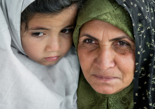 iranian woman with her daughter, Central County, Kerman, Iran