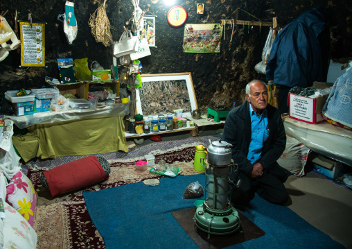 old man in his troglodyte house, Kerman province, Meymand, Iran