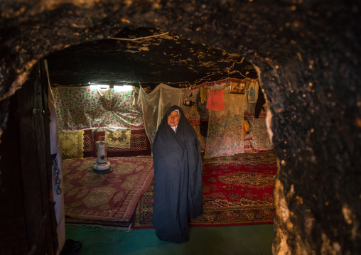 old widow woman in her troglodyte house, Kerman province, Meymand, Iran