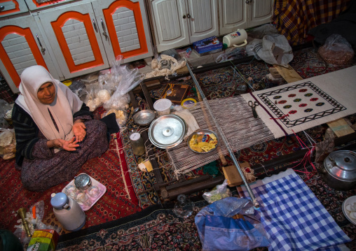 old widow woman in her troglodyte house, Kerman province, Meymand, Iran