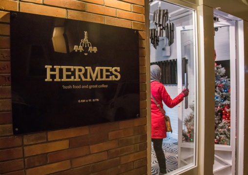 iranian woman going inside hermes restaurant, Isfahan Province, isfahan, Iran