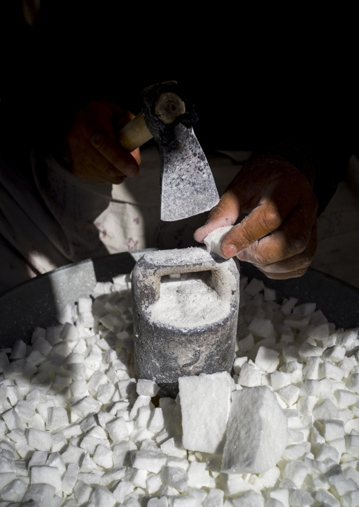 Men Crashing Sugar In The Bazaar, Sanandaj, Iran