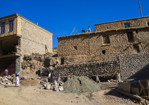 Men Building A House In The Old Kurdish Village Of Palangan, Iran