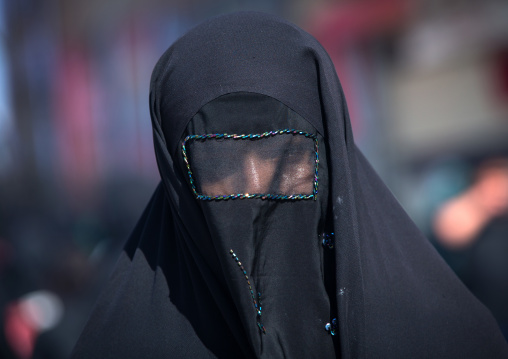 Iranian Shiite Muslim Woman Mourning Imam Hussein On The Day Of Tasua With Her Face Covered By A Veil, Lorestan Province, Khorramabad, Iran