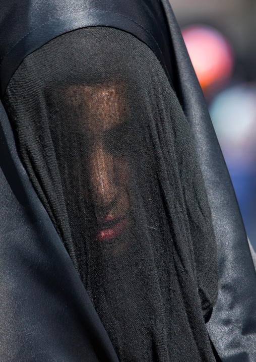 Iranian Shiite Muslim Woman Mourning Imam Hussein On The Day Of Tasua With Her Face Covered By A Veil, Lorestan Province, Khorramabad, Iran