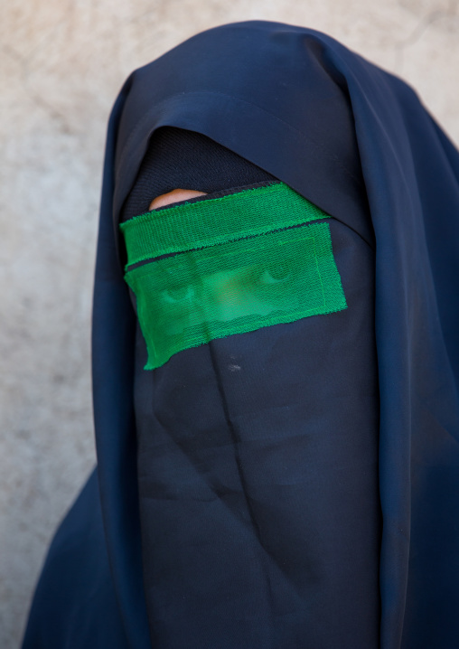 Iranian Shiite Muslim Woman Mourning Imam Hussein On The Day Of Tasua With Her Face Covered By A Green Veil, Lorestan Province, Khorramabad, Iran