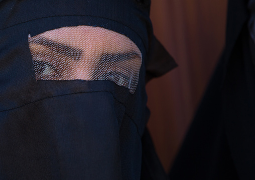 Iranian Shiite Muslim Woman Mourning Imam Hussein On The Day Of Tasua With Her Face Covered By A Veil, Lorestan Province, Khorramabad, Iran