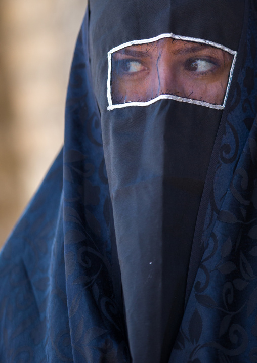 Iranian Shiite Muslim Woman Mourning Imam Hussein On The Day Of Tasua With Her Face Covered By A Veil, Lorestan Province, Khorramabad, Iran