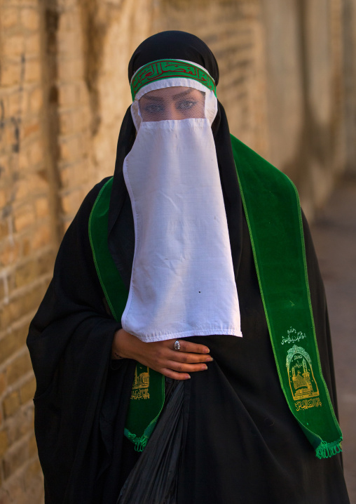 Iranian Shiite Muslim Woman Mourning Imam Hussein On The Day Of Tasua With Her Face Covered By A Veil, Lorestan Province, Khorramabad, Iran