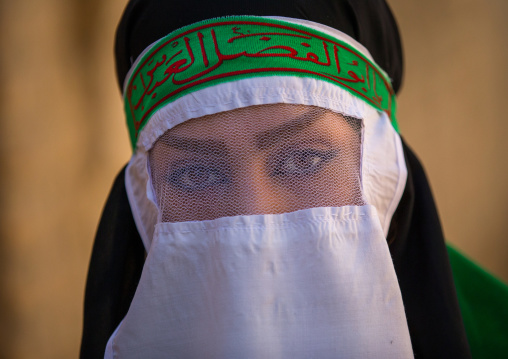 Iranian Shiite Muslim Woman Mourning Imam Hussein On The Day Of Tasua With Her Face Covered By A Veil, Lorestan Province, Khorramabad, Iran