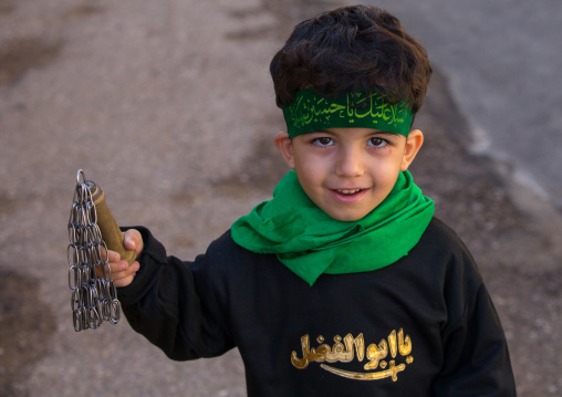 An Iranian Shiite Boy During Tasua Celebrations One Day Before Ashura, Lorestan Province, Khorramabad, Iran