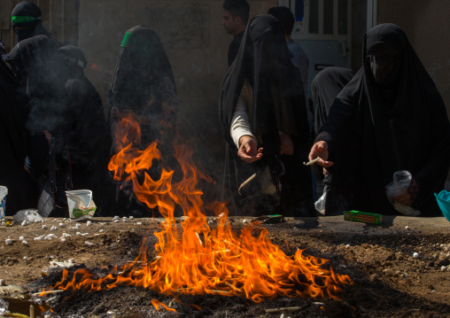 Iranian Women Light Candles During Chehel Menbari Festival On Tasua To Commemorate The Martyrdom Anniversary Of Hussein, Lorestan Province, Khorramabad, Iran