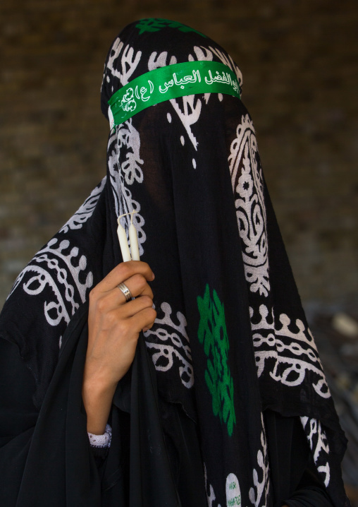 Iranian Shiite Muslim Woman Mourning Imam Hussein On The Day Of Tasua With Her Face Covered By A Veil, Lorestan Province, Khorramabad, Iran