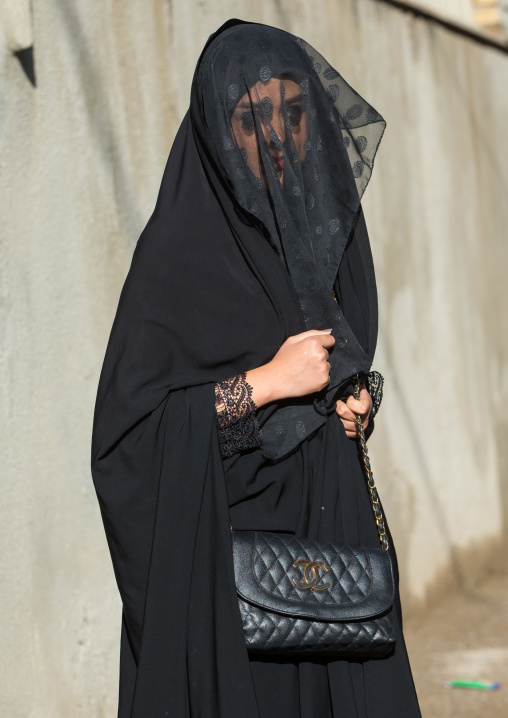 Iranian Shiite Muslim Woman Mourning Imam Hussein On The Day Of Tasua With Her Face Covered By A Veil, Lorestan Province, Khorramabad, Iran