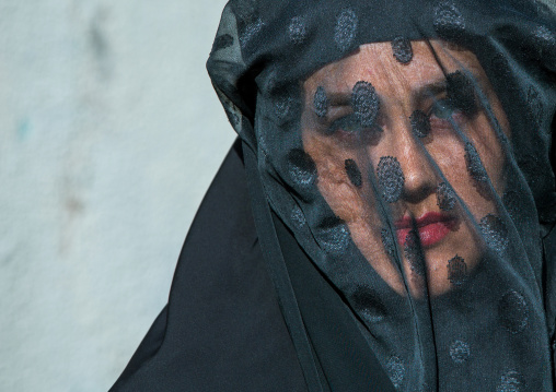 Iranian Shiite Muslim Woman Mourning Imam Hussein On The Day Of Tasua With Her Face Covered By A Veil, Lorestan Province, Khorramabad, Iran