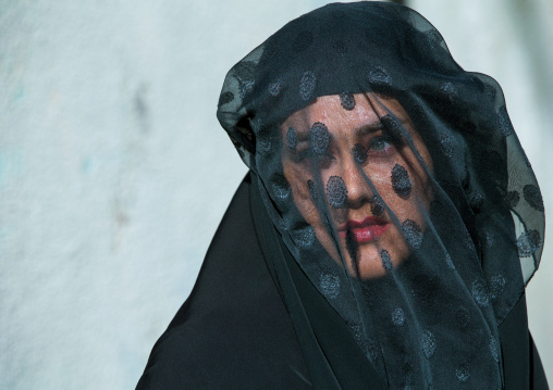 Iranian Shiite Muslim Woman Mourning Imam Hussein On The Day Of Tasua With Her Face Covered By A Veil, Lorestan Province, Khorramabad, Iran