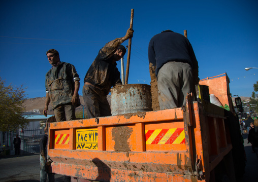 Iranian Shiite Muslim Men Bringing Mud For Ashura, The Day Of The Death Of Imam Hussein, Kurdistan Province, Bijar, Iran