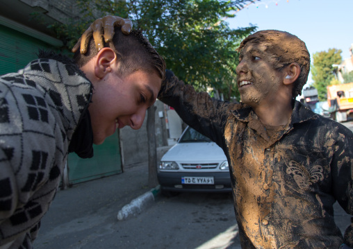 Iranian Shiite Muslim Men Covering With Mud During Ashura Day, Kurdistan Province, Bijar, Iran