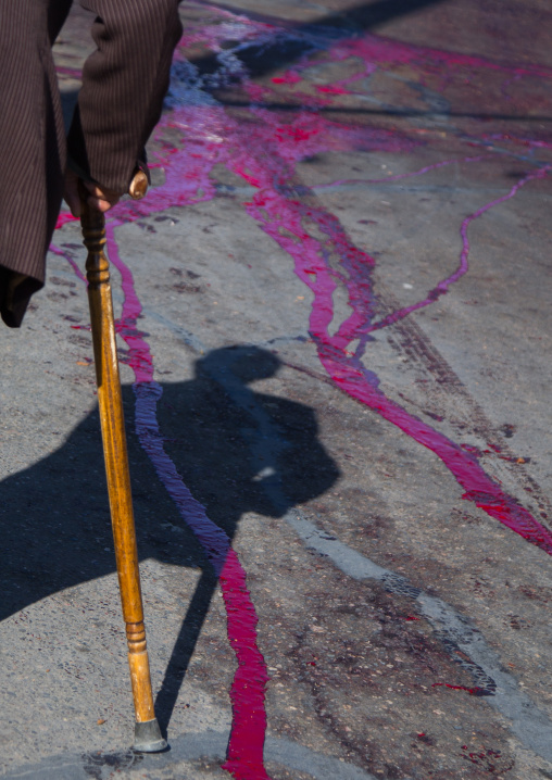 Shadow Of A Shiite Man Standing In The Blood Of A Ritually Slaughtered Sheep On Ashura, The Day Of The Death Of Imam Hussein, Kurdistan Province, Bijar, Iran