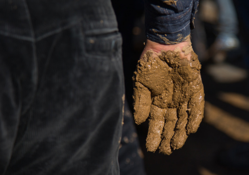 Iranian Shiite Muslim Man Hand Covered In Mud During Ashura Day, Kurdistan Province, Bijar, Iran