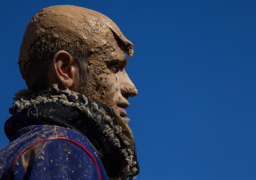 Iranian Shiite Muslim Man Covered In Mud During Ashura Day, Kurdistan Province, Bijar, Iran